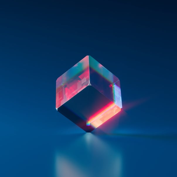 Cube made of glass with a blue background